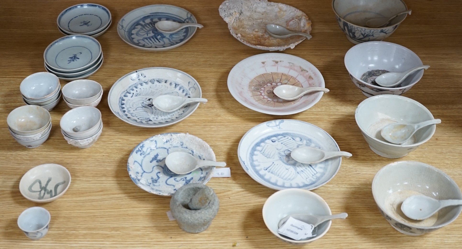 A group of Chinese Tek Sing cargo wares, including blue and white or enamelled plates, bowls, spoons, tea bowls, etc. (42)